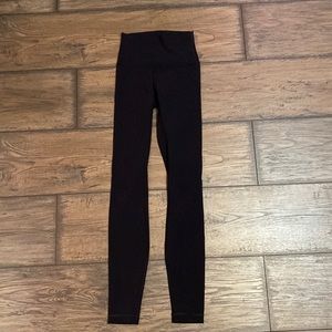 black Lululemon leggings SMALL RIP IN KNEE